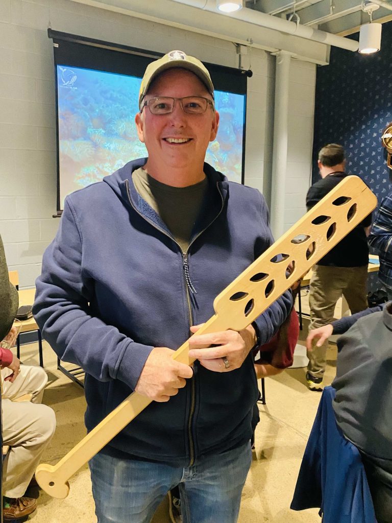 Chris Woodley holding the SODZ mash paddle after winning the April Club Competition